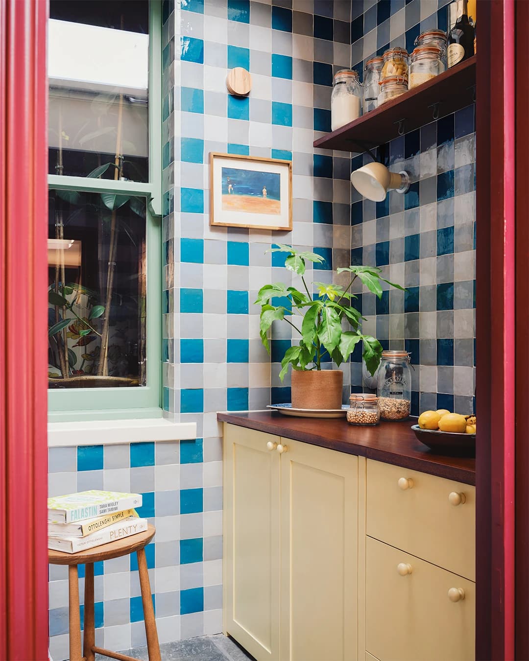 Rustic kitchen walls in Zellige checkerboard.